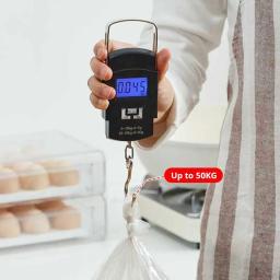 Balança Digital Portátil para Bagagem 50kg com Display LCD e Régua para Malas de Viagem - Image 1