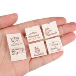 50 pçs pano vestuário etiquetas de vestuário feito à mão padrão dos desenhos animados tecido de malha costurar tags artesanal diy costura artesanato suprimentos - Image 4