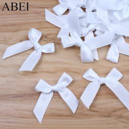 50 pçs/lote branco arcos de cetim fita laço laços para casamento scrapbooking decoração para casa enfeites costura artesanal - Image 1