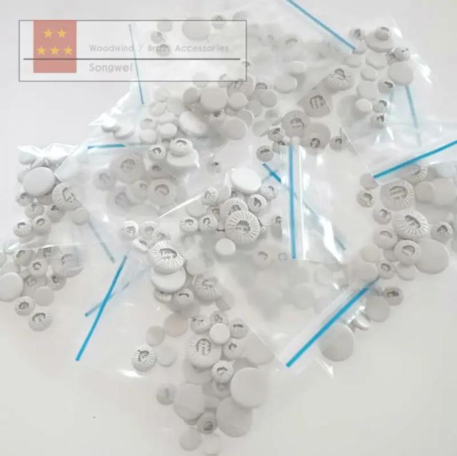 Almofadas de Couro Branco para Clarinete: Peças de Reparo de Luxo para Instrumentos de Sopro