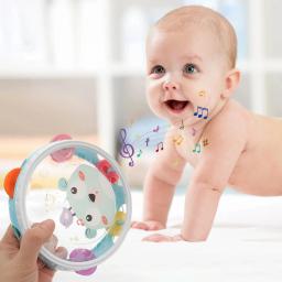 Desenhos animados mão balançando chocalho brinquedos para o bebê, instrumentos musicais, batendo palmas pandeiro, Montessori brinquedos educativos da bateria, 0-12 meses - Image 1