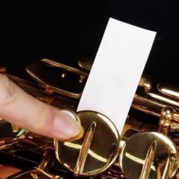 Flauta saxofone clarinete botão papel absorvente folha de cuidados limpos papéis anti-pegajosos secagem absorvente limpador sax acessórios - Image 4