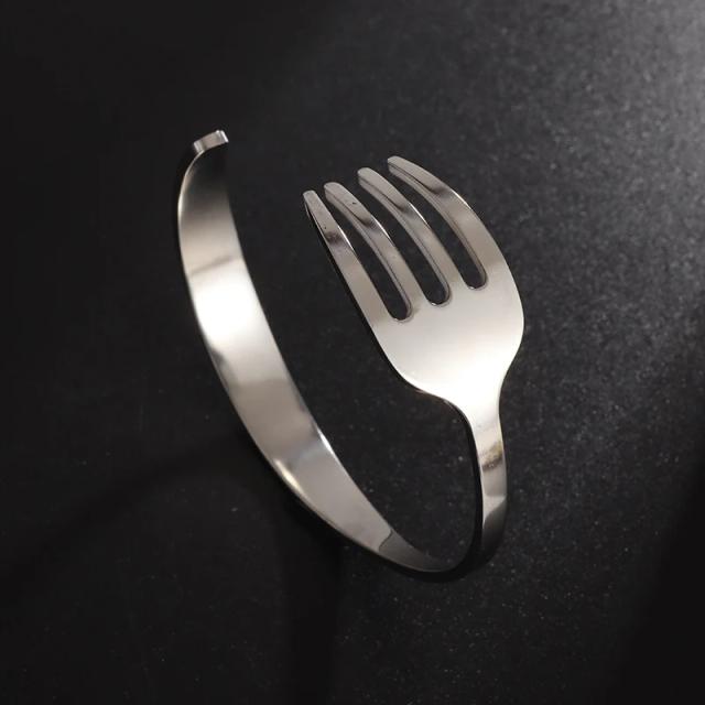 Pulseira de Aço Inoxidável com Design Criativo de Faca e Garfo - Acessório Divertido e Elegante para Homens e Mulheres