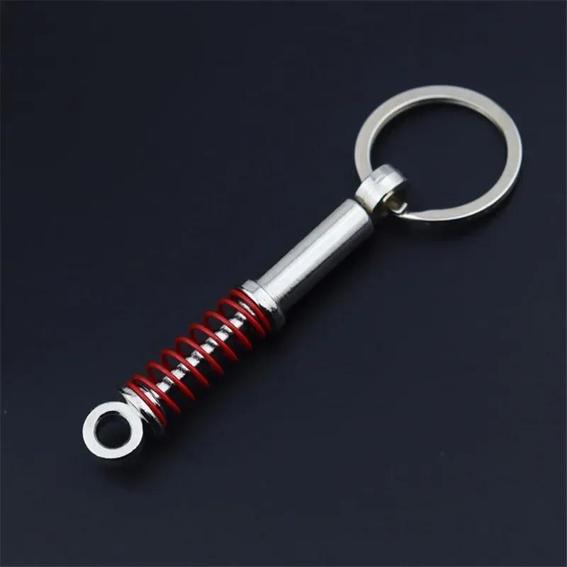 Carro chaveiro de pistão amortecedor forma chaveiro decoração chaveiro pingente acessórios do carro para carro automóvel - Image 1