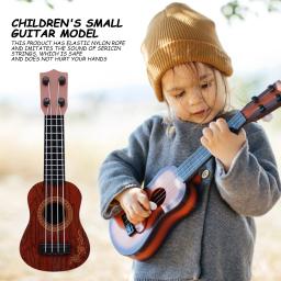 Mini guitarra clássica ukulele para crianças, 4 cordas, instrumento musical para crianças, brinquedos educativos montessori - Image 1