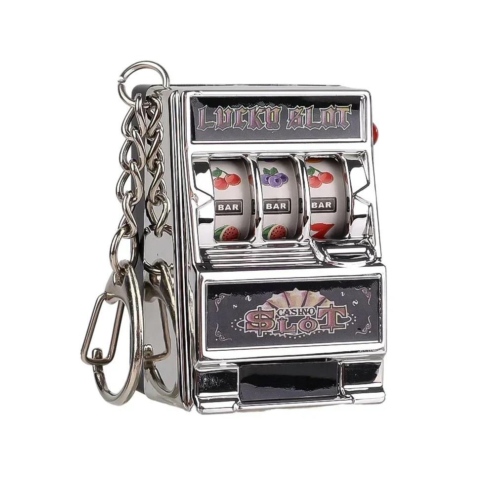 2 pçs mini jogo slot máquina chaveiros criativo arcade bolso fruta sorte jackpot gadget antiestresse brinquedo jogos engraçados chaveiro - Image 1