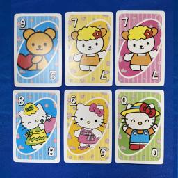 Mattel Games UNO Jogo de cartas Hello Kitty para a noite da família com gráficos temáticos do programa de TV e uma regra especial para 2 a 10 jogadores - Image 3