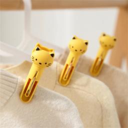 Prendedores de roupa plásticos à prova de vento, prendedores de roupa, clipes multifuncionais de toalha de praia, meias fofas, gatos criativos, 12pcs - Image 4