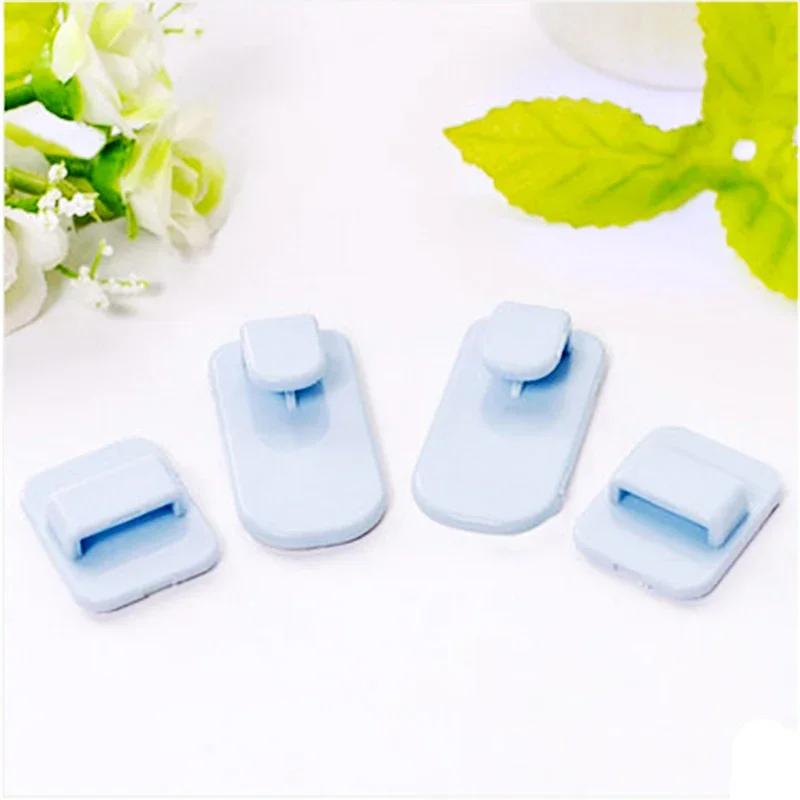 Ganchos adesivos autoadesivos de plástico, conjunto de gancho pegajoso, ar condicionado, controle remoto, chave, prático, armazenamento de parede, cabide forte - Image 1
