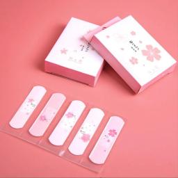 20 pçs/lote ferida tiras ao ar livre portátil adesivo bandagens de gesso kawaii bonito dos desenhos animados estampado kit de primeiros socorros de emergência para crianças - Image 1