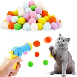 Lançamento interativo treinamento brinquedo para gato, criativo Mini tiro arma jogos, estiramento bola de pelúcia brinquedos, pet fornecimentos, gatinho, novo - Image 1