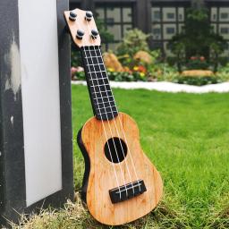 Brinquedo de guitarra ukulele clássico para crianças, instrumentos musicais, mini guitarra, educação precoce, guitarra pequena, 4 cordas - Image 3