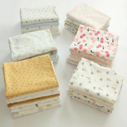 Tecido de malha elástica algodão puro pelo medidor para costurar roupas pano do bebê diy flores grossas dos desenhos animados animal azul macio branco - Image 1