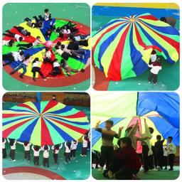 Criança esporte ao ar livre pára-quedas brinquedos de acampamento ao ar livre brinquedo interativo arco-íris guarda-chuva salto-saco ballute jogar para crianças jardim de infância - Image 2