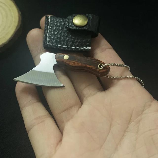 Faca de Cozinha Portátil em Aço Inoxidável: Ideal para Cortar Frutas e Ótima Opção de Presente com Design de Chaveiro.