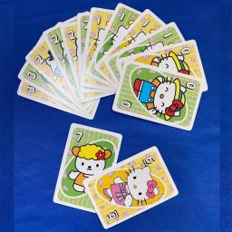 Mattel Games UNO Jogo de cartas Hello Kitty para a noite da família com gráficos temáticos do programa de TV e uma regra especial para 2 a 10 jogadores - Image 5