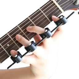 Instrumento musical universal amplificador de dedo ukulele guitarra baixo acessórios piano iniciantes prática espaçamento ajustável - Image 1