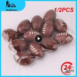 Mini bola de rugby não inflável para crianças, pequeno futebol americano, brinquedos anti-stress de futebol, jogo, 1 pc, 2pcs - Image 1