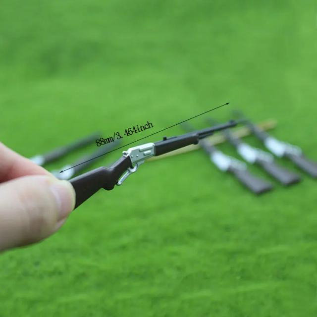 Pistola de Metal em Miniatura para Decoração de Casa de Bonecas - Modelo Realista em Escala 1/12
